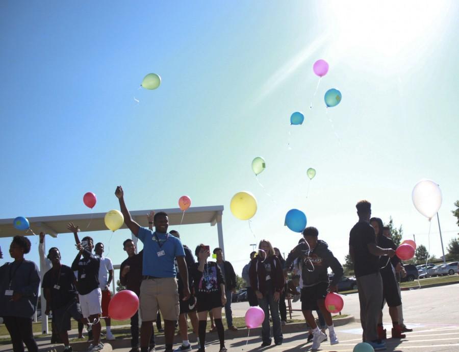 In an effort to learn the lesson of letting go of everyday struggles, each student in Alison Thornton’s English 4 class released a balloon to visually represent breaking the chains of their personal conflicts.