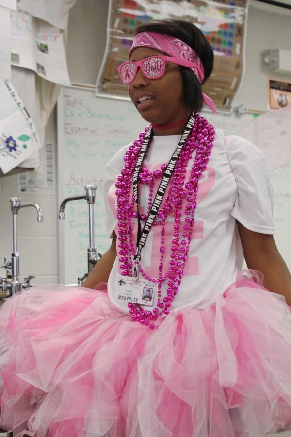 All decked out for pink out day, senior Cian Haynes, precipitates in Brest Cancer Week by dressing up.