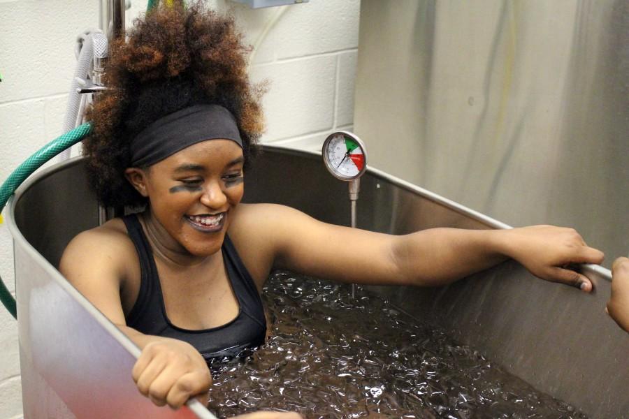 Preparing for her upcoming state competition, Cierra Jackson takes an ice bath to help relax her muscles. We have to want to win for ourselves and not because our coach wants us to, Jackson said. 