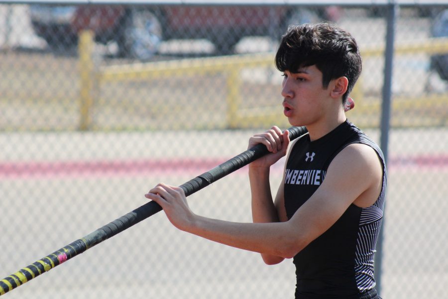While preparing for his Pole Vault competition, 
Sophomore Ethan Feliciano wears the new Under Armour uniforms. Its a good thing to have a brand because we can get recognized better and the product is nicer.